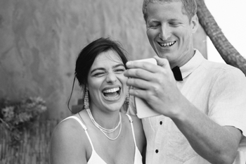 bride and groom after they vow on skype with family oversea