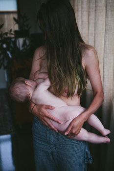 mum breastfeeding her baby