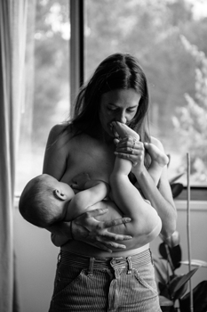 mother breastfeeding her baby