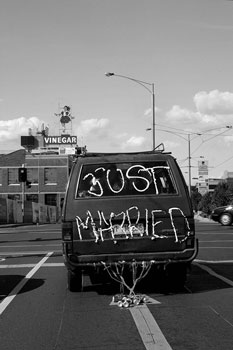 decorated car with just married sign