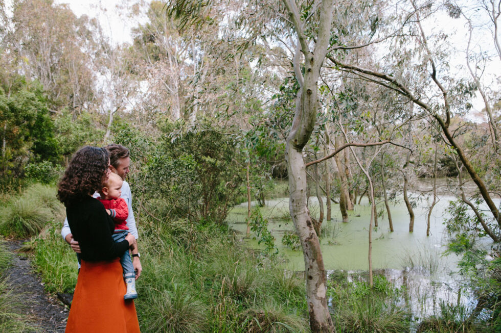 couple with their baby at merry creek