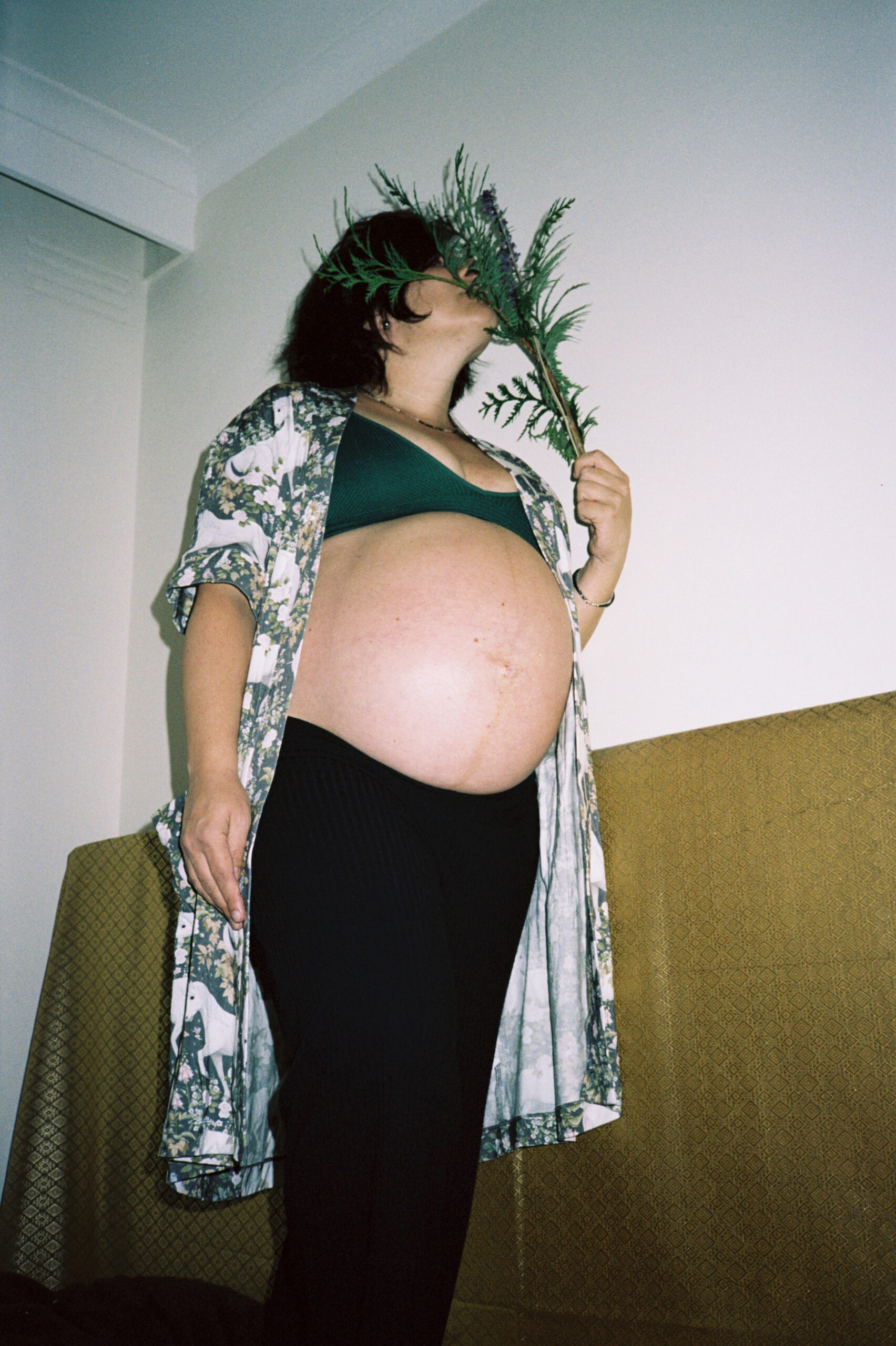 Pregnant woman holding flowers